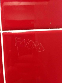 These bathroom stall carvings are really starting to get offensive