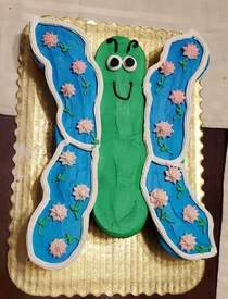 This cupcake-cake is either a butterfly or pickle rick