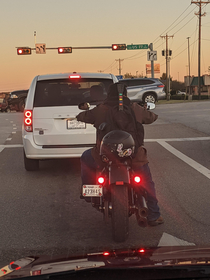 This guy had his guitar hero guitar on his bike like he was headed to a gig