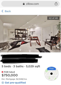 This house on Zillow features a full on sex dungeon