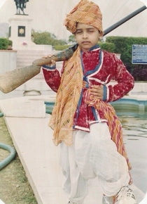 This is my old school pic At age  rocking an old Indian military outfit with some Adidas kicks LOL