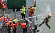 This is what a happens when a kid finds a random hose at a Coast Guard demonstration