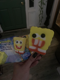 This spongebob ice pop Thank god Im an adult  This is an ice cream for nightmares  Look at his face