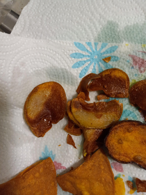 Thought Id try making homemade potatoes chips Roommate walked in his first response How are they burnt and uncooked at the same time  