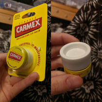 Tiny pot of  lip balm hides the base so you cant see that theyve put an indent so you get even less than you thought you were getting