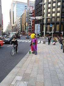 Today I met Mangetsu Man Full Moon Man a superhero from Tokyo Japan He keeps the streets clean literally