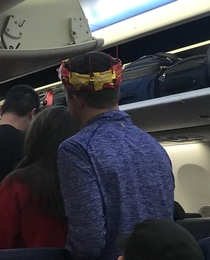 Today on my flight it was a passengers birthday so a flight attendant made him a crown out of peanut bags and those little swords that they put in cocktail drinks