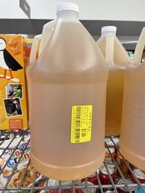 Todays markdown special a gallon bottle of mystery orange fluid