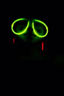 Took a photo of my daughter wearing glow in the dark glasses and it somehow made her look like a grinning sloth
