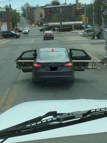 Transporting a ladder in the back seat of a sedan Love me some Norristown PA