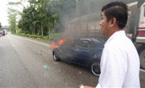 Truck driver saves mans life from flaming car after collision that he was involved in 
