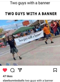 Two guys with a banner