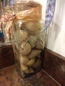 Was cleaning my moms bathroom and realized that this jar thats been sitting there for  years is not filled with sea shells Its filled with pasta shells