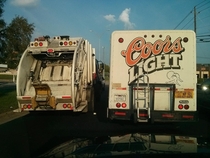 Was stuck behind these two garbage trucks for several miles the other morning