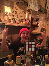 We asked this Japanese guy if he could complete the Rubiks cube in his bar  seconds later