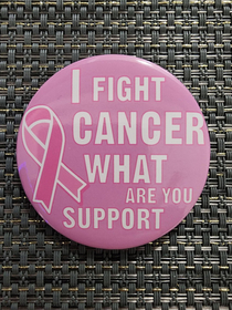 Wife bought pins for breast cancer awareness