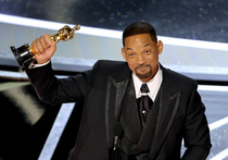 Will Smith accepting his Oscar for Best Slap in a Dramatic Overreaction