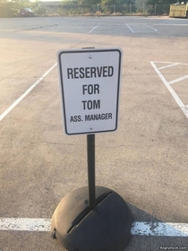 With a job title that awesome Tom definitely deserved a reserved parking spot