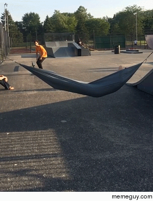  hippie flip over guy in a hammock