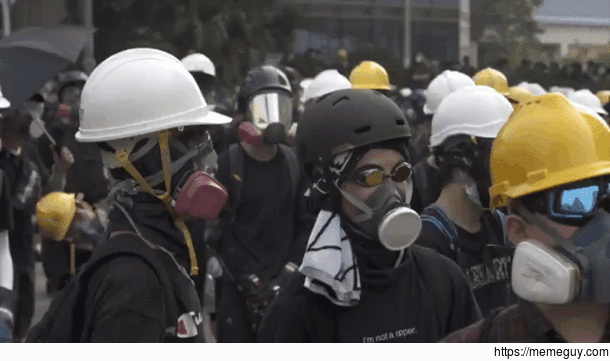  Hong Kong Protesters Testing Out Their Helmets Before The Police Raid