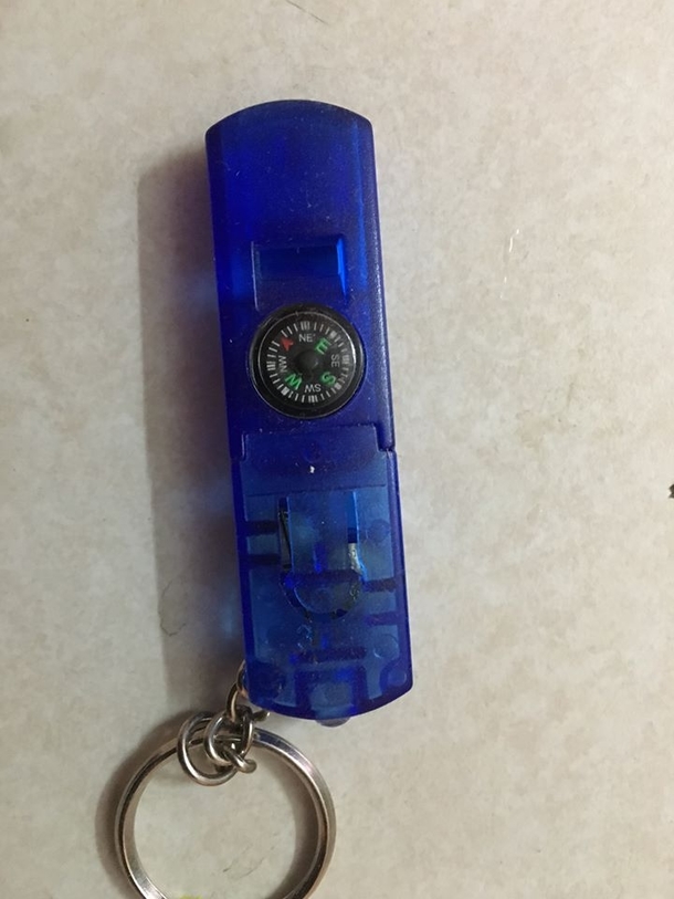 A combination Flashlight USB Compass and Keyring otherwise known as a FUCKstick