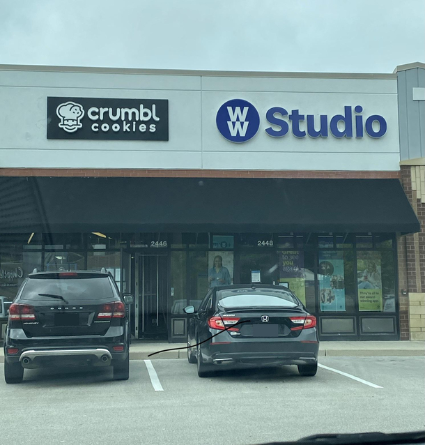 A cookie shop is opening up next to a Weight Watchers