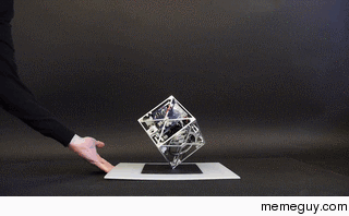 A Cube That Can Jump Up Balance and Walk