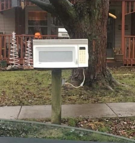 A family friend found it funny to demote the microwave to mailbox duty