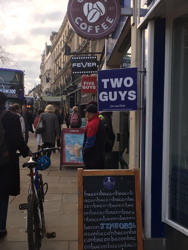 A five guys opened up a couple of doors down from the local sandwich shop So the sandwich shop decided to change their name