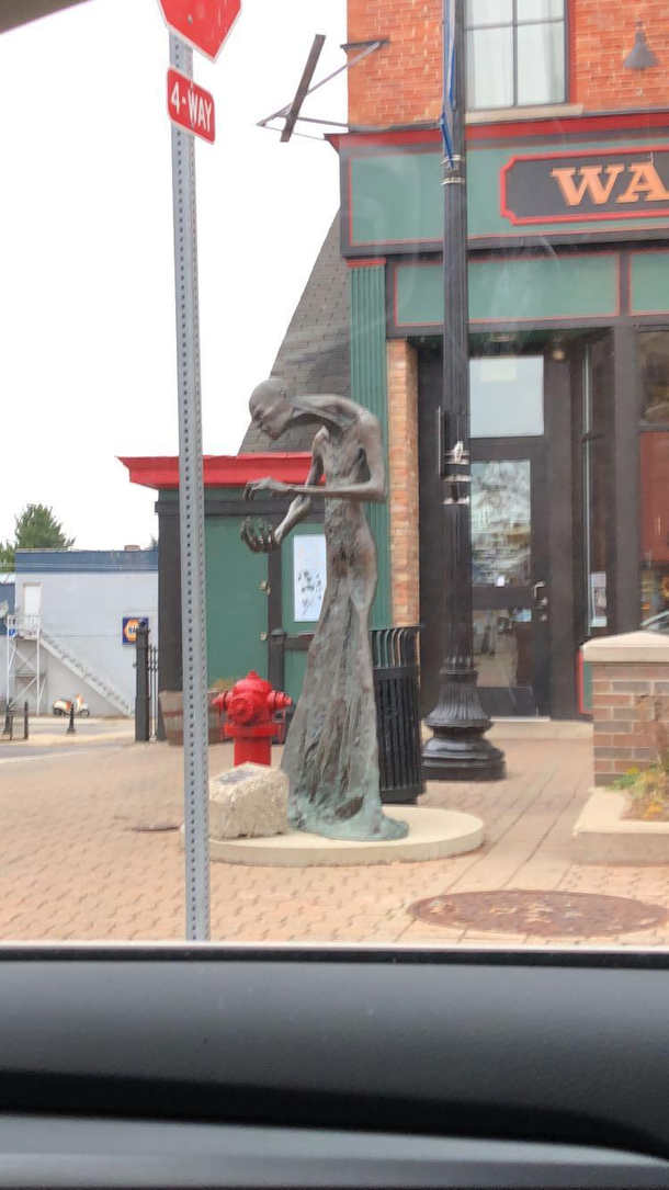 A nice downtown with this creepy statue