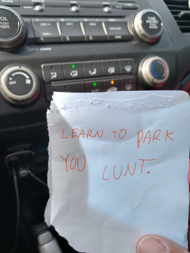 A pissed off old lady put this under my wiper yesterday God bless her