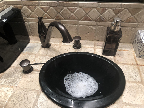 A soap dispenser for each hand and another one in case you missed the first two