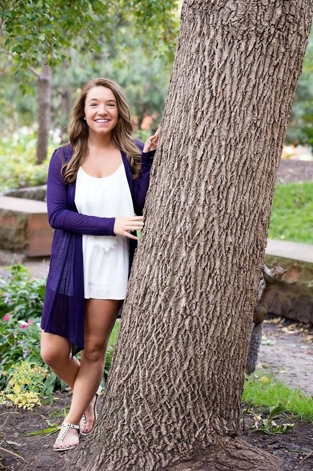 A squirrels senior portrait photobombed by some girl