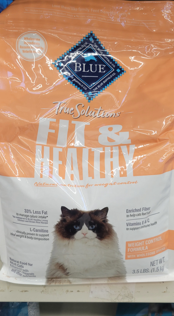 Absolute Unit of a cat on this bag of cat food