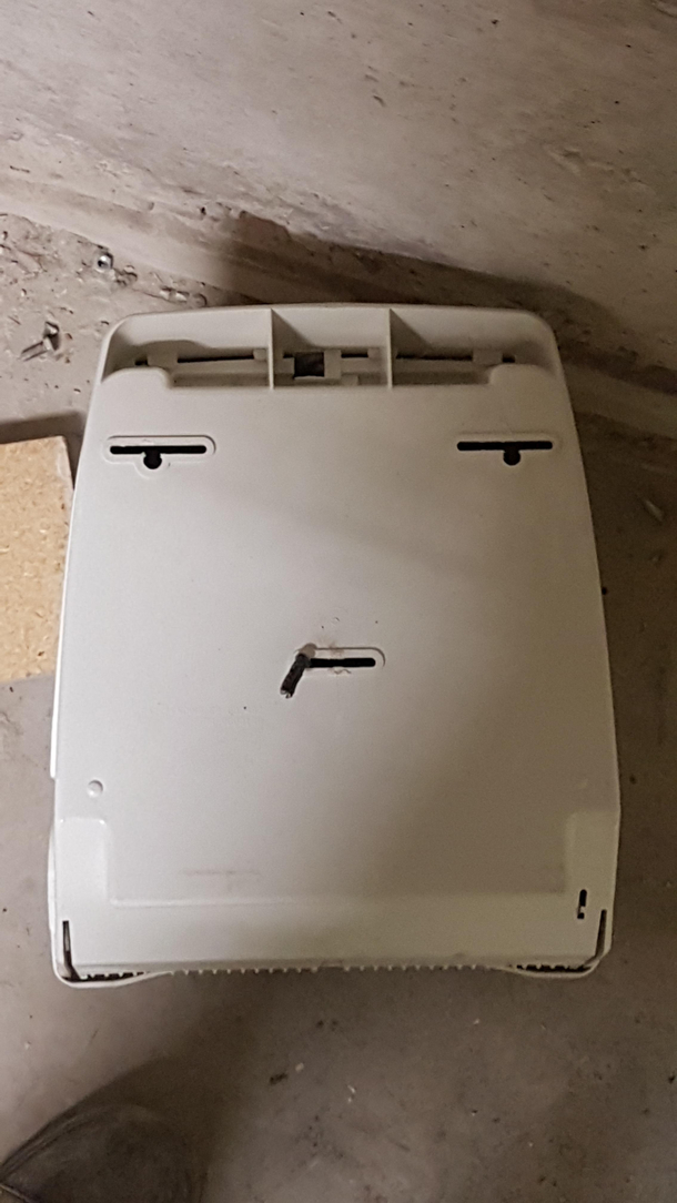 Accidentally knocked the paper towel dispenser off the wall It didnt seem happy about it