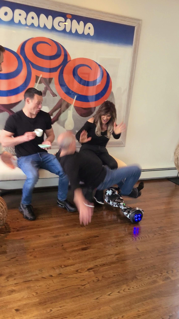 Action shot of my father falling off a hover board