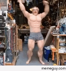 Adam Savage dancing in a muscle suit