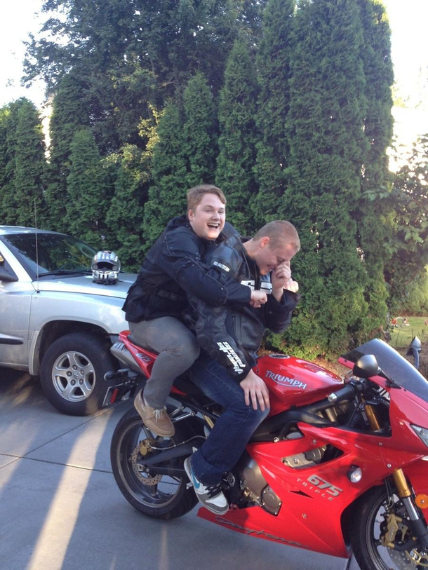 After years of wanting to ride on a motorcycle I finally convinced my friend to take me for a spinthe facial expression says it all