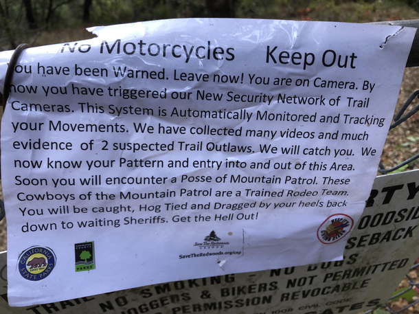 Aggressive-aggressive sign on a local hikeI think the hog tied comment really sums it up