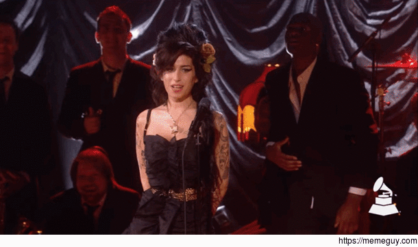 Amy Winehouse winning her first Grammy in 