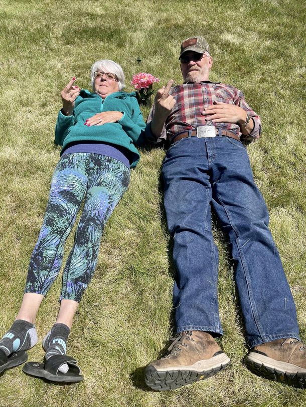 An older couple checking out the view from their future grave plots they recently purchased