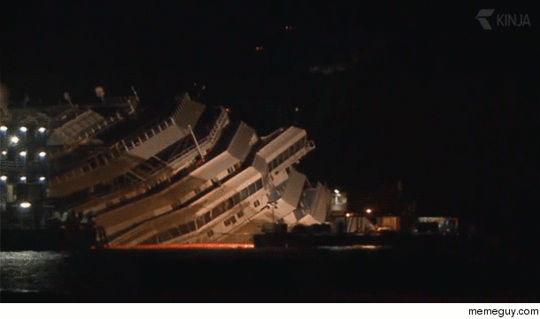 Another view of the Costa Concodia being righted waterline clearly visible