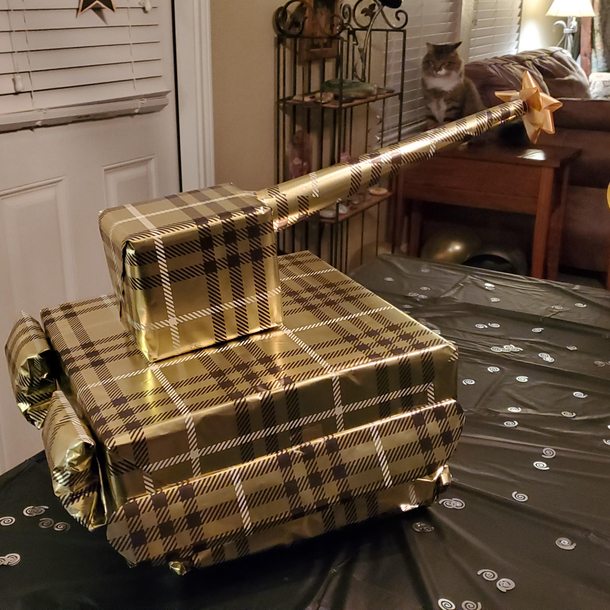 Asked Husband to wrap the gifts we got for Kiddos birthday Hour later he comes back in with this Think well have to hide it from Fluffy Pants overnight