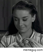 Audrey Hepburn sure knows how to smile