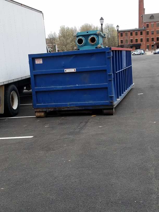 Baby robot peeking out of crib