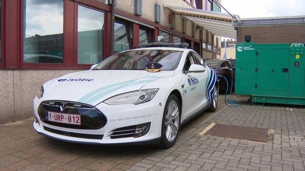 Belgian police charging green tesla with a diesel generator 