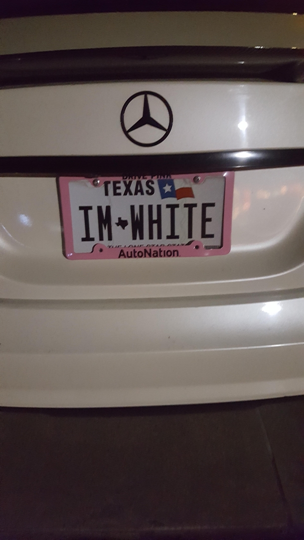 Black guys license plate in FtWorth