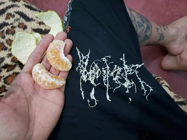 Black metal band logo created thanks to a mandarin