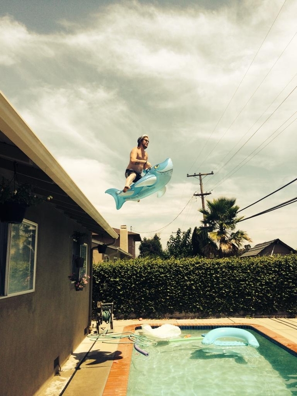 BoozeSharkRoofPoolfunny picture my buddy took of me First reddit submission