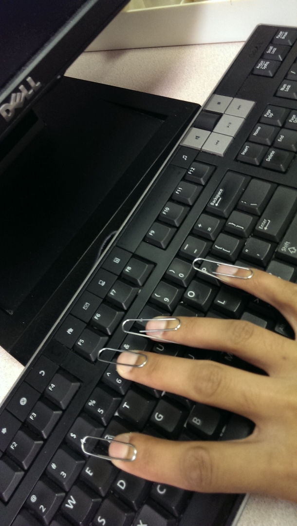 Bored at work and wondered how girls type with artificial nails so